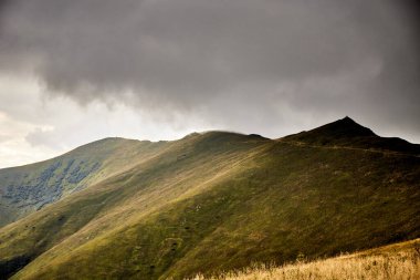 Mountain range. Carpathian Mountain, Ukraine. Walking and hiking trails in Borzhava ridge. Rural area of carpathian mountains in autumn