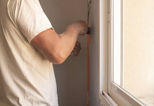 Builder works with a spatula. High quality photo