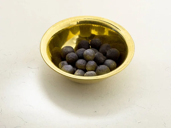 Ayurvedic bitkisel ilaç gulika ya da tablet