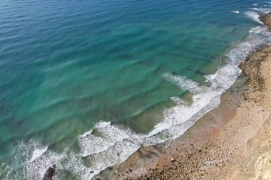 Hava manzaralı balıkçılar Portekiz 'e doğru yol alıyorlar Porto Bayan Praia da Luz plajı Rocha Negra