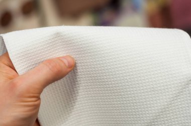 Beyaz waffle havlusu, mutfak tekstili, seçici odak.