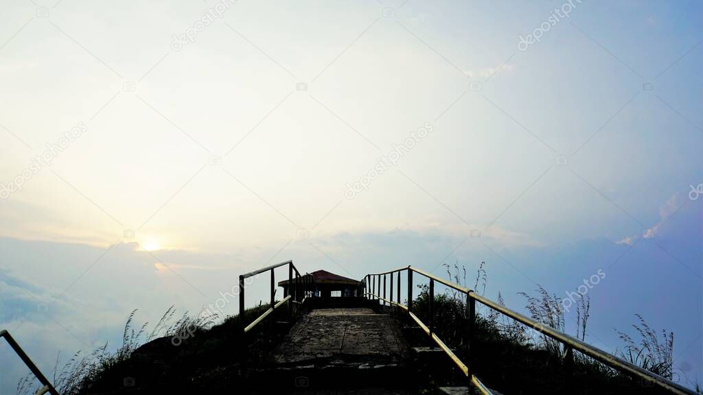 Beautiful sightseeing place Needle Rock view point or suicide point. Hiking place covered with mist, natural forest and mountain landscape. Best place to view sunrise and sunset.
