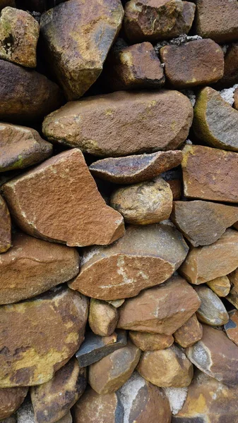 Bela Imagem Padrão Fundo Uma Parede Feita Pedra Redonda Cor — Fotografia de Stock