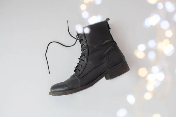 Flying Winter Leather Boot Christmas Fairy Lights Second Hand Winter — Stock Photo, Image