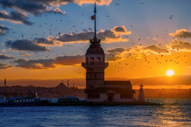 Awesome sunset at Maiden Tower. An iconic landmark on Istanbul's skyline, the Maiden's Tower has a rich history dating back to the fourth century, as well as a few legends.