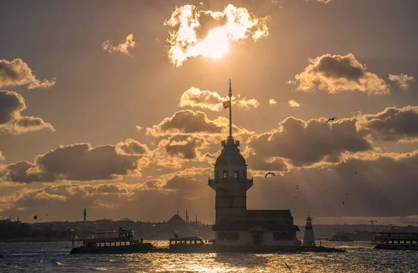Awesome sunset at Maiden Tower. An iconic landmark on Istanbul's skyline, the Maiden's Tower has a rich history dating back to the fourth century, as well as a few legends.