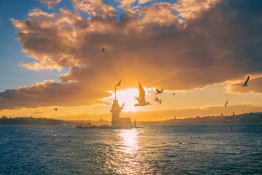 Awesome sunset at Maiden Tower. An iconic landmark on Istanbul's skyline, the Maiden's Tower has a rich history dating back to the fourth century, as well as a few legends.