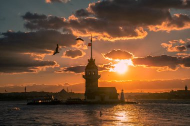Awesome sunset at Maiden Tower. An iconic landmark on Istanbul's skyline, the Maiden's Tower has a rich history dating back to the fourth century, as well as a few legends.
