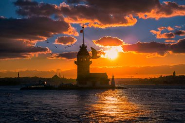 Awesome sunset at Maiden Tower. An iconic landmark on Istanbul's skyline, the Maiden's Tower has a rich history dating back to the fourth century, as well as a few legends.