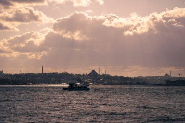 Tour boats traveling on the Bosphorus. A beautiful view from the Bosphorus of Istanbul.