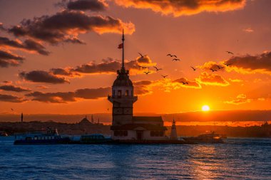Awesome sunset at Maiden Tower. An iconic landmark on Istanbul's skyline, the Maiden's Tower has a rich history dating back to the fourth century, as well as a few legends.