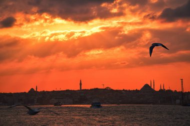 Hagia Sophia, Topkapi Palace and Blue Mosque on sunset in Istanbul. View from a cloudy day in Istanbul