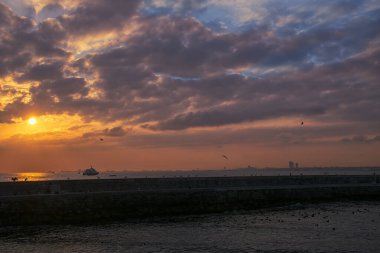 Sunset view from Kadikoy, Istanbul. View from a cloudy day in Istanbul.