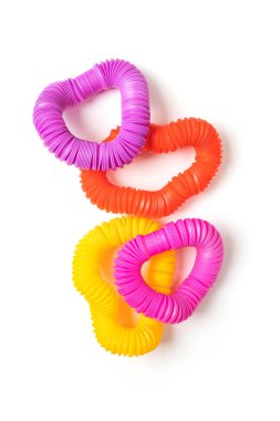 Farklı form ve renkler, modaya uygun çocuk oyuncakları, pop-tüpleri..  