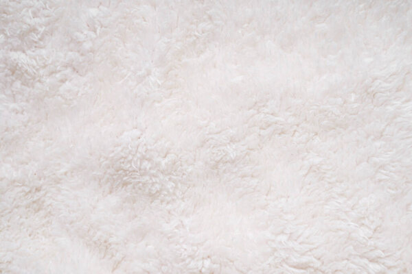 White fur texture background. Warm fluffy textile