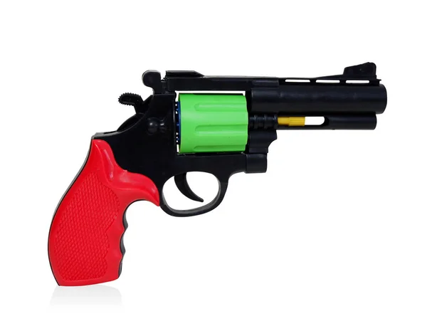 サイドビューカラフルな銃のおもちゃ白い背景に コピースペース — ストック写真
