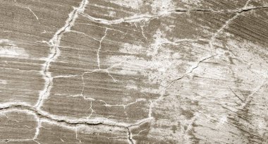 Arka plan için gri çatlamış çimento dokusu. duvar çizikleri