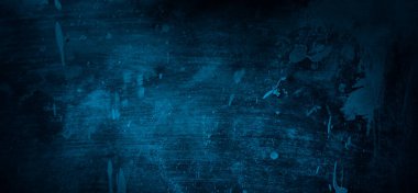 Mavi duvar arka planı. Koyu mavi duvarlar korkutucu. Çizilmiş mavi çimento