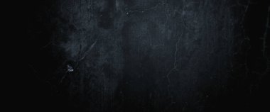 Ürkütücü koyu duvarlar, arka plan için hafif siyah beton dokusu.