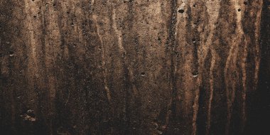 Arka plan için koyu çimento. Lekeler ve çiziklerle dolu eski püskü duvarlar..