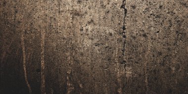 Arka plan için koyu çimento. Lekeler ve çiziklerle dolu eski püskü duvarlar..