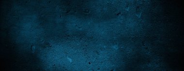 Arka plan için korkutucu renkli duvar dokusu. Koyu çimento ve füme poster..