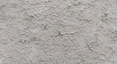 Gri beton duvar dokusu, beyaz alçılı duvar dokusu veya arka plan, dağınık sokak duvarı.