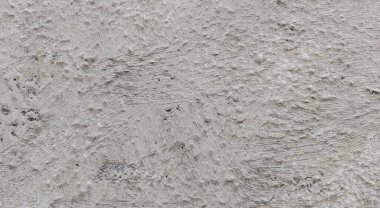 Gri beton duvar dokusu, beyaz alçılı duvar dokusu veya arka plan, dağınık sokak duvarı.
