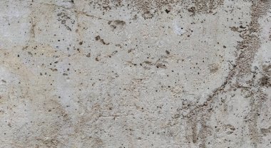 Gri beton duvar dokusu, beyaz alçılı duvar dokusu veya arka plan, dağınık sokak duvarı.