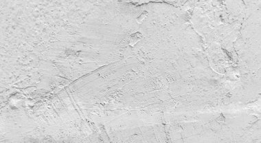 Gri beton duvar dokusu, beyaz alçılı duvar dokusu veya arka plan, dağınık sokak duvarı.