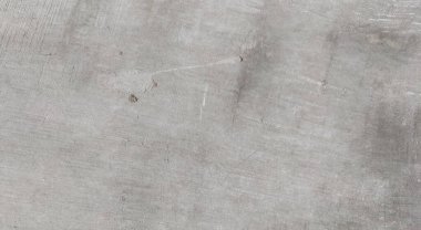 Gri beton duvar dokusu, beyaz alçılı duvar dokusu veya arka plan, dağınık sokak duvarı.