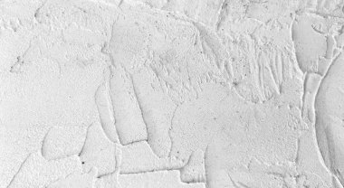 Gri beton duvar dokusu, beyaz alçılı duvar dokusu veya arka plan, dağınık sokak duvarı.