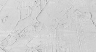 Gri beton duvar dokusu, beyaz alçılı duvar dokusu veya arka plan, dağınık sokak duvarı.