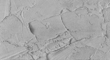 Gri beton duvar dokusu, beyaz alçılı duvar dokusu veya arka plan, dağınık sokak duvarı.