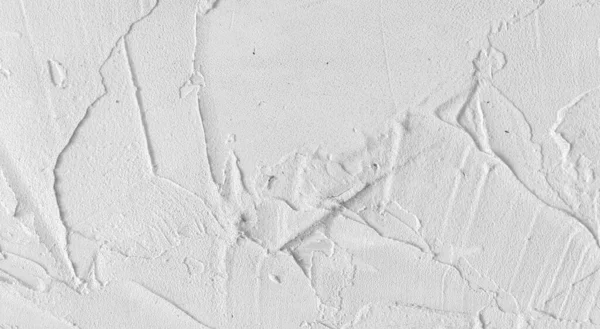 Gri beton duvar dokusu, beyaz alçılı duvar dokusu veya arka plan, dağınık sokak duvarı.