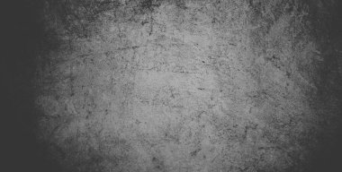 Siyah beton duvar ya da koyu gri kabarık taş doku arkaplanı.