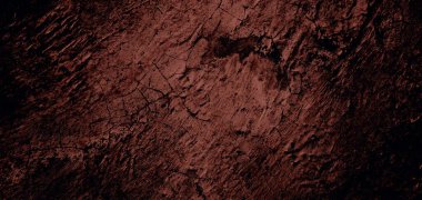 Duvar çiziklerle dolu. Arka plan için kirli çimento dokusu, korkutucu koyu duvar. Kara duvar.