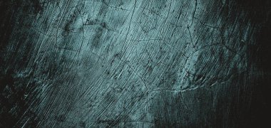 Duvar çiziklerle dolu. Arka plan için kirli çimento dokusu, korkutucu koyu duvar. Kara duvar.