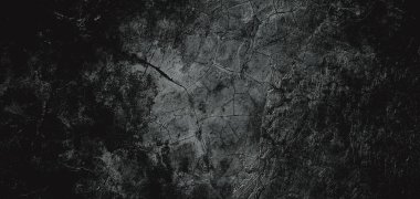 Duvar çiziklerle dolu. Arka plan için kirli çimento dokusu, korkutucu koyu duvar. Kara duvar.