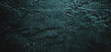 Duvar çiziklerle dolu. Arka plan için kirli çimento dokusu, korkutucu koyu duvar. Kara duvar.