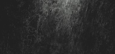 Duvar çiziklerle dolu. Arka plan için kirli çimento dokusu, korkutucu koyu duvar. Kara duvar.