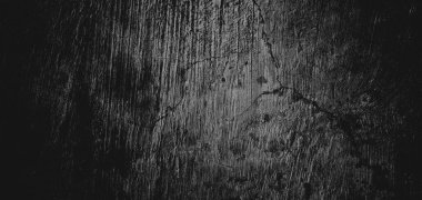 Duvar çiziklerle dolu. Arka plan için kirli çimento dokusu, korkutucu koyu duvar. Kara duvar.