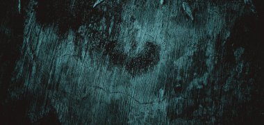 Duvar çiziklerle dolu. Arka plan için kirli çimento dokusu, korkutucu koyu duvar. Kara duvar.