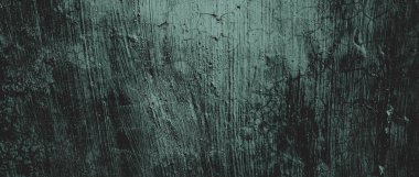 Duvar çiziklerle dolu. Arka plan için kirli çimento dokusu, korkutucu koyu duvar. Kara duvar.