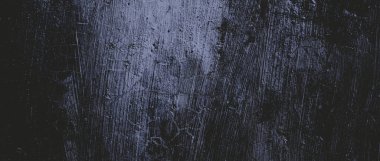 Duvar çiziklerle dolu. Arka plan için kirli çimento dokusu, korkutucu koyu duvar. Kara duvar.