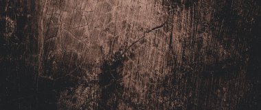 Duvar çiziklerle dolu. Arka plan için kirli çimento dokusu, korkutucu koyu duvar. Kara duvar.