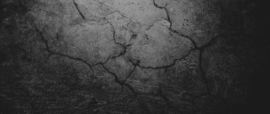 Duvar çiziklerle dolu. Arka plan için kirli çimento dokusu, korkutucu koyu duvar. Kara duvar.