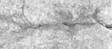 Katı, pürüzlü, beyaz kumtaşı yüzeyi. Doğal kaya görüntüsünü kapat