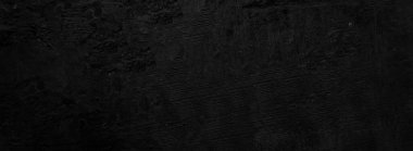 Ürkütücü karanlık duvarlar, arka plan için uzun siyah beton dokusu.