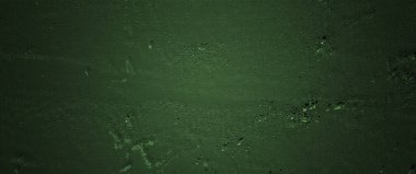 Panoramik arkaplan için yeşil duvar betonu. Tasarım için koyu çimento arkaplanı boş